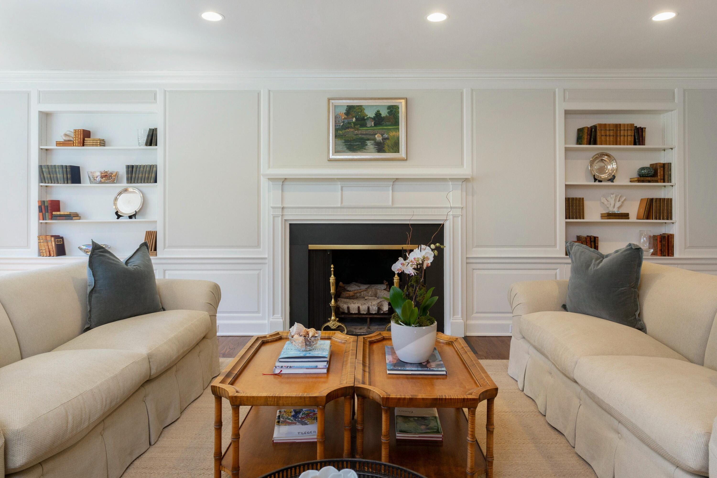 16 Half Mile Road Darien, CT 06820 - Photo 7 of 59 a living room with furniture and a fireplace