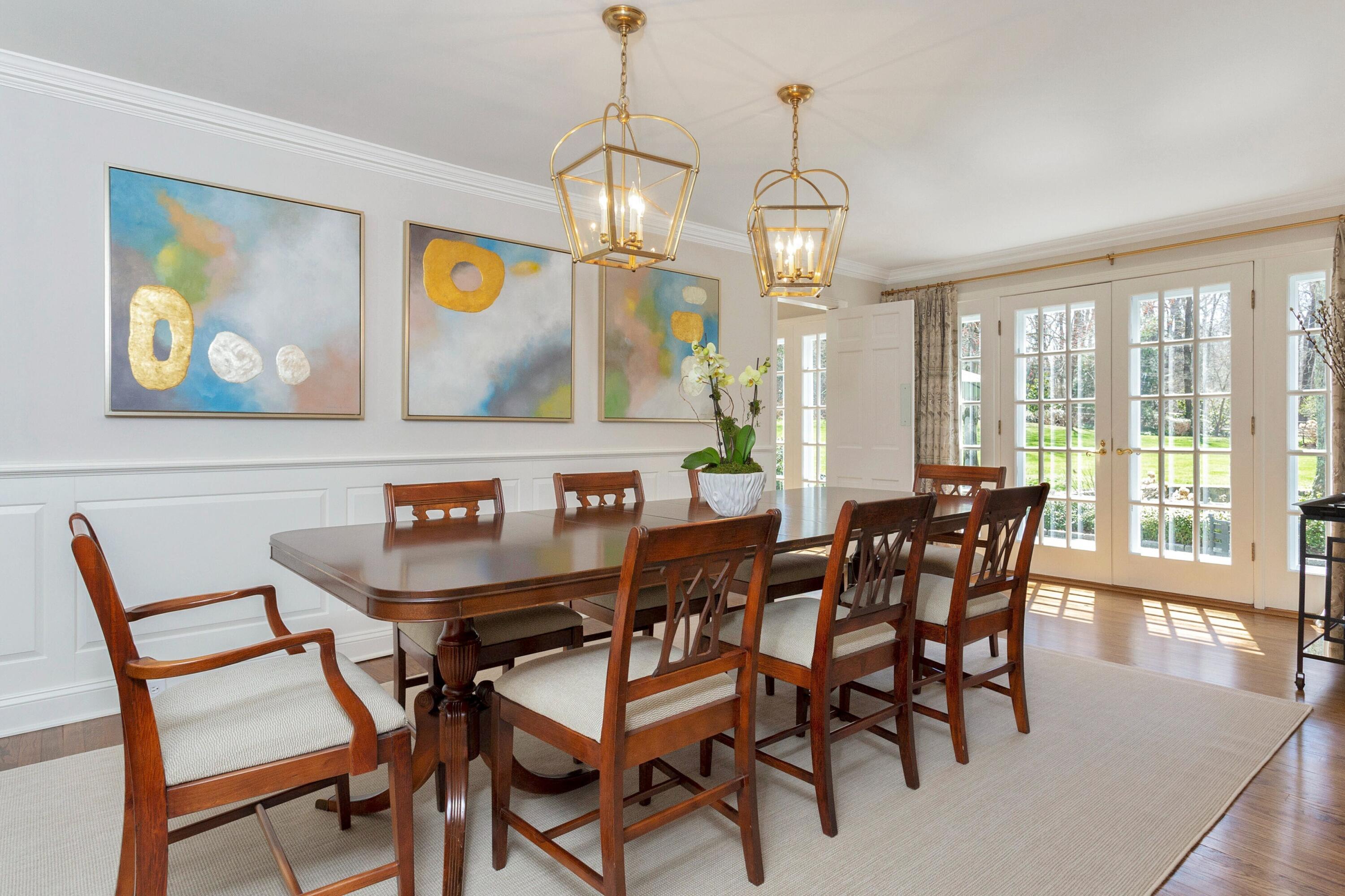 16 Half Mile Road Darien, CT 06820 - Photo 9 of 59 a view of a dining room with furniture wooden floor and a chandelier