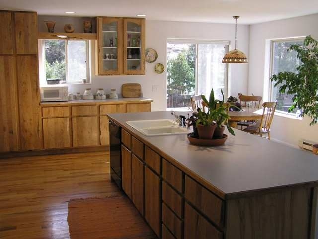 12665 G Road Cortez, CO 81321 - Photo 3 of 9 a kitchen with a sink a counter top space and living room