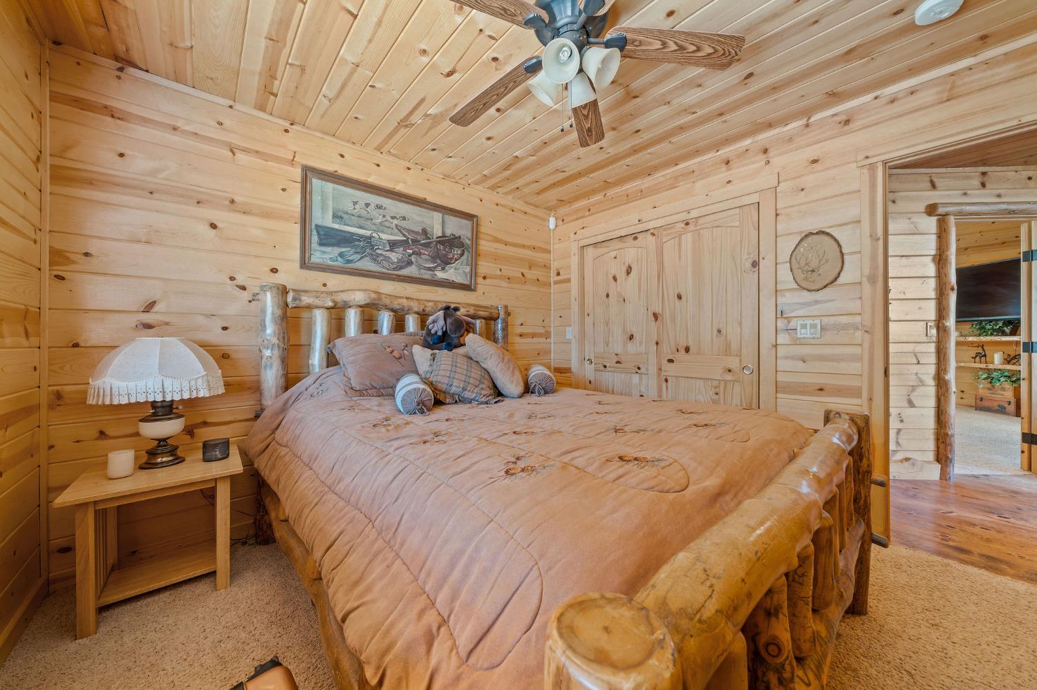 6800 West Murray Creek Road San Andreas, CA 95249 - Photo 22 of 47 a bed room with a bed and a chair