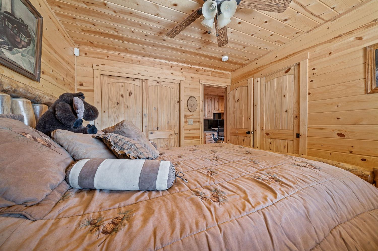 6800 West Murray Creek Road San Andreas, CA 95249 - Photo 23 of 47 a bed room with a bed and a walk in closet