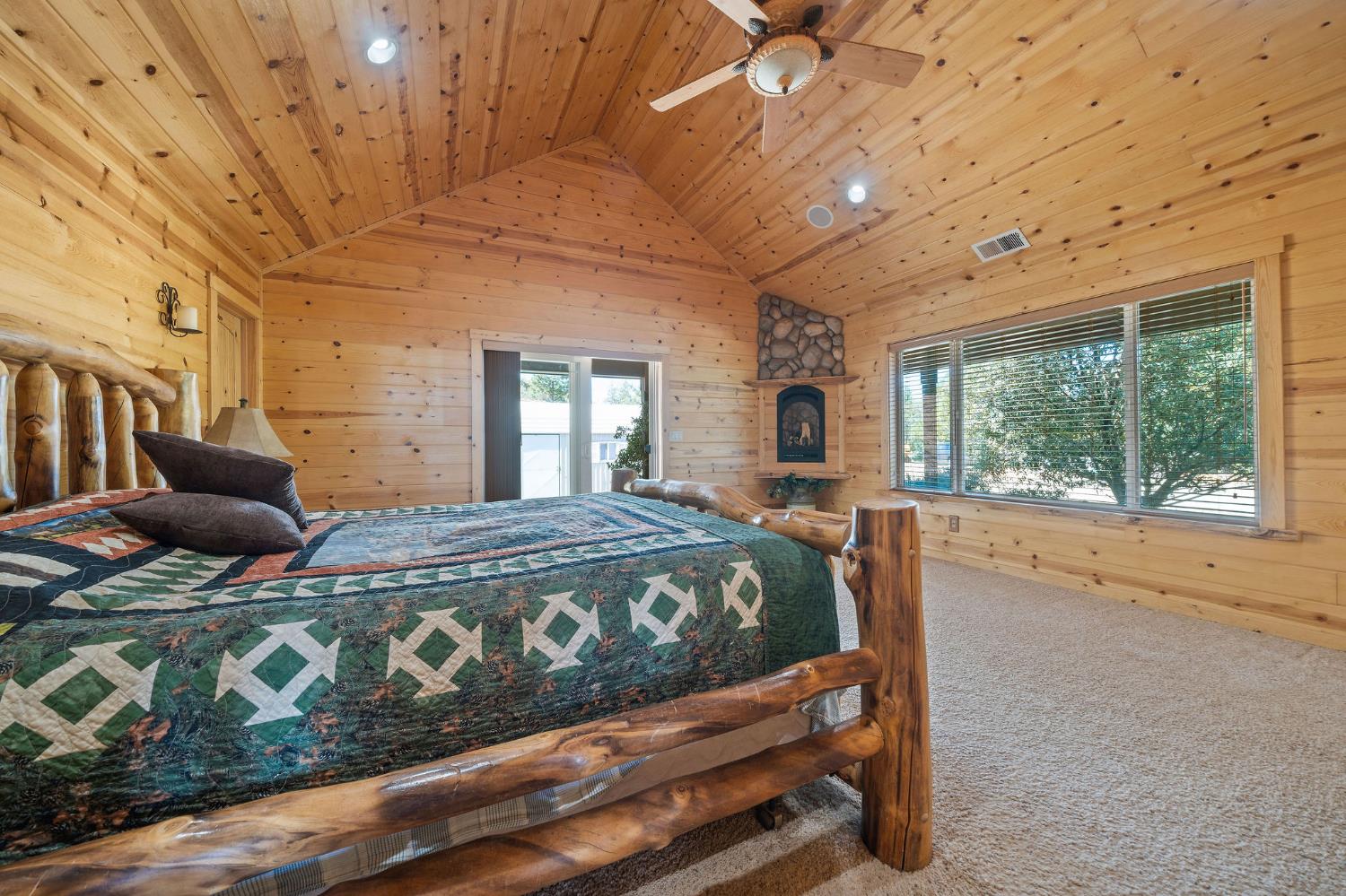 6800 West Murray Creek Road San Andreas, CA 95249 - Photo 27 of 47 a bed sitting in a spacious bedroom next to a window