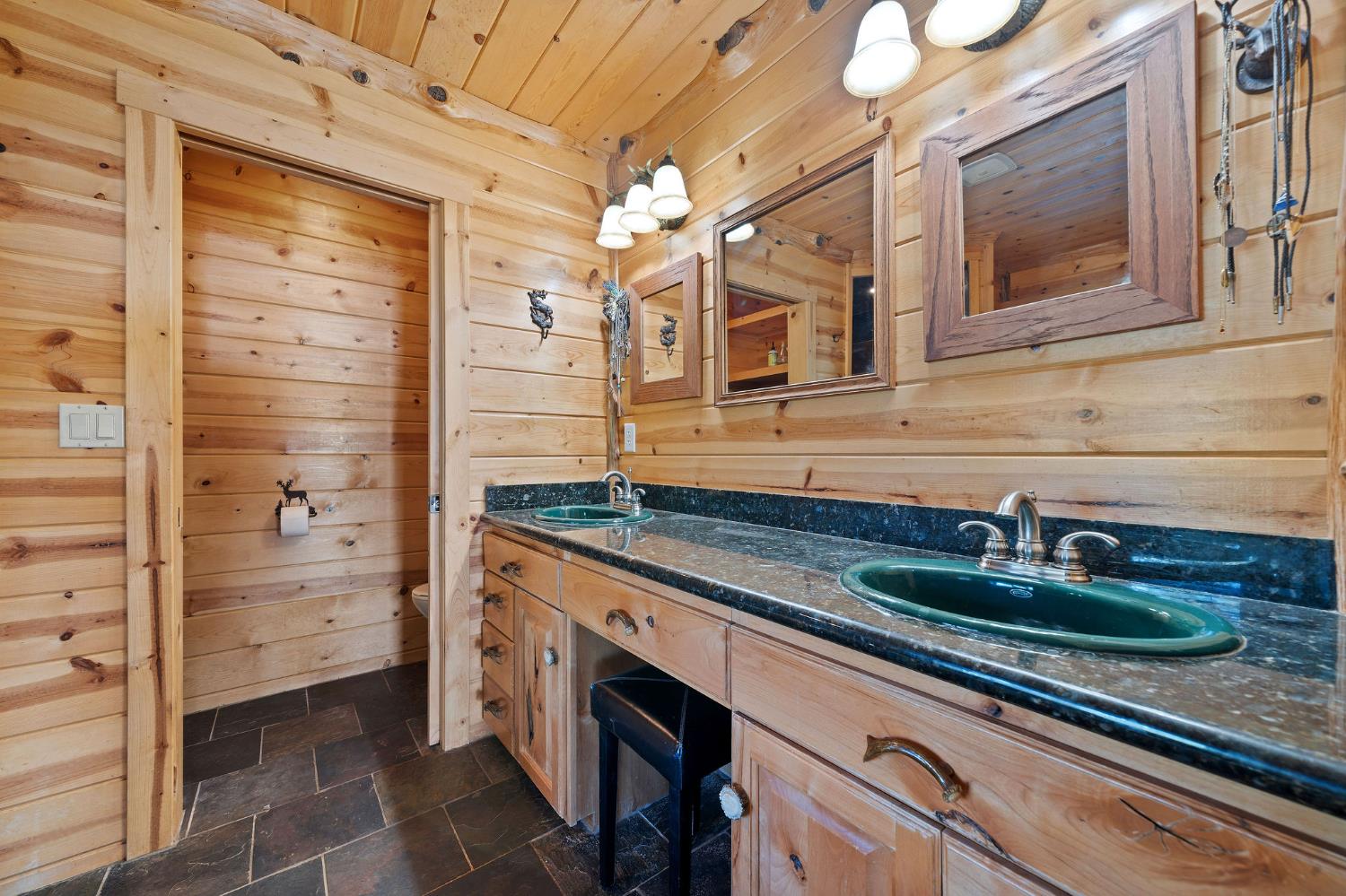 6800 West Murray Creek Road San Andreas, CA 95249 - Photo 29 of 47 a bathroom with a sink and a mirror
