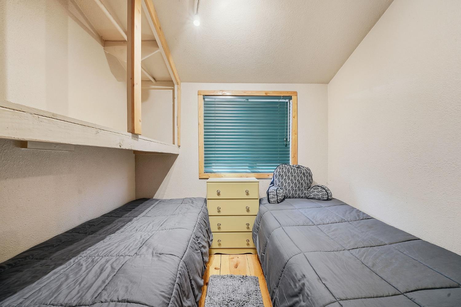 6800 West Murray Creek Road San Andreas, CA 95249 - Photo 34 of 47 a bedroom with a bed and window