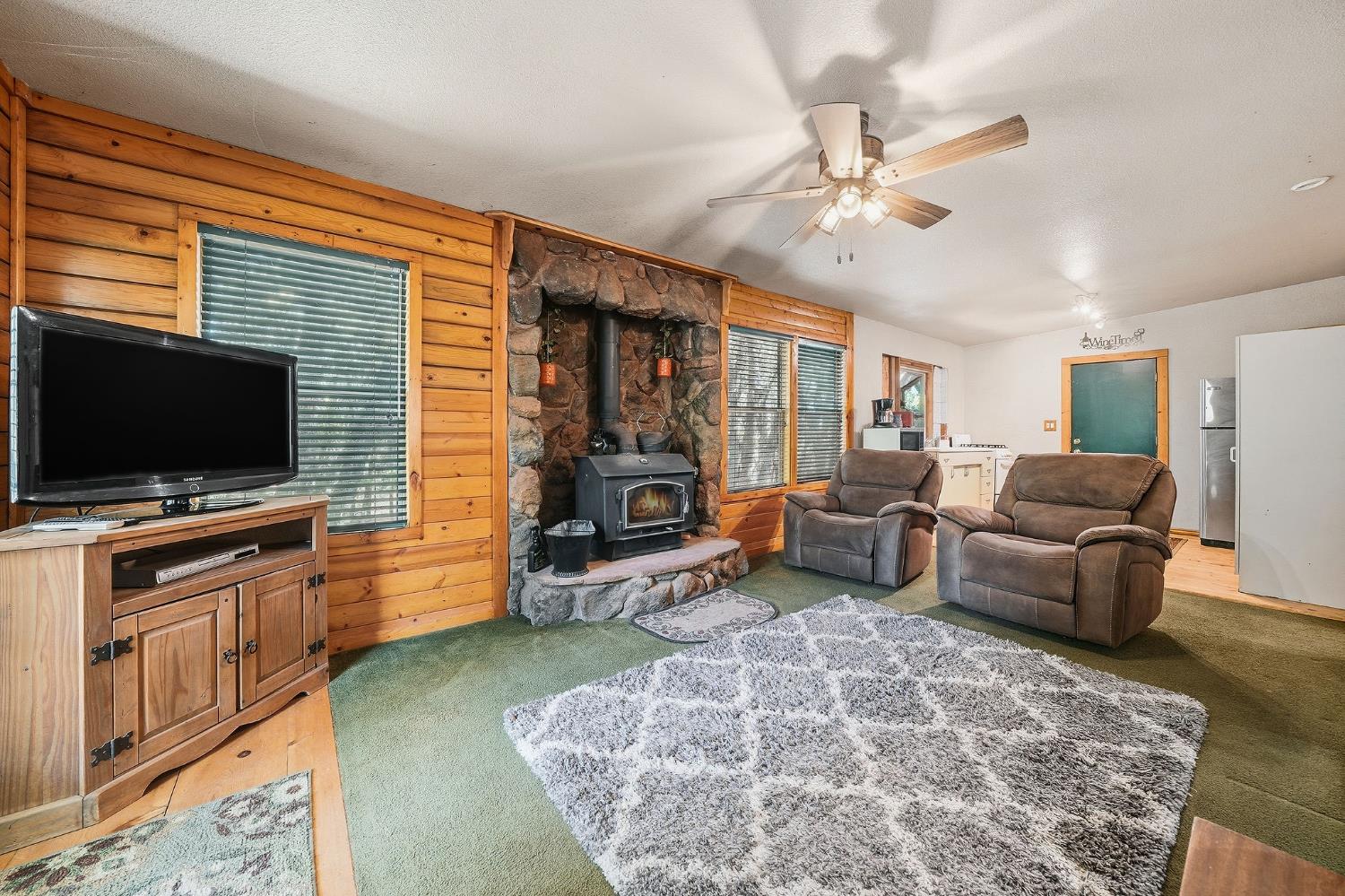 6800 West Murray Creek Road San Andreas, CA 95249 - Photo 39 of 47 a living room with furniture and a flat screen tv
