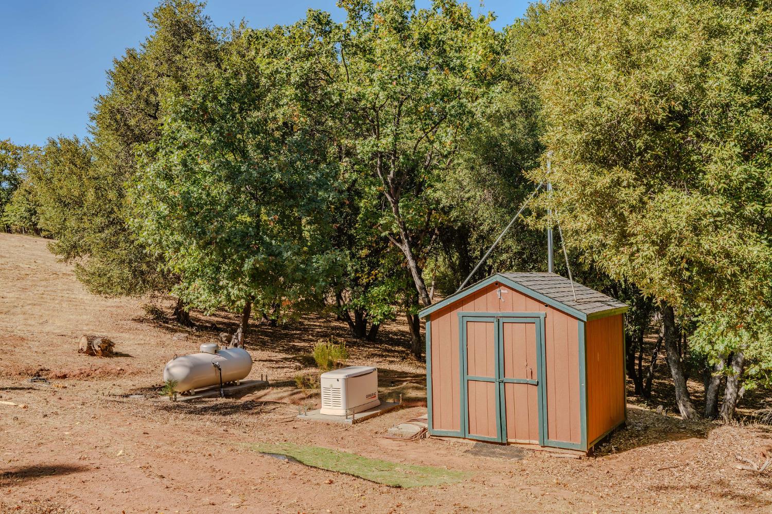 6800 West Murray Creek Road San Andreas, CA 95249 - Photo 44 of 47 a front view of a house with a yard