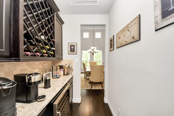 a view of a kitchen and utility room