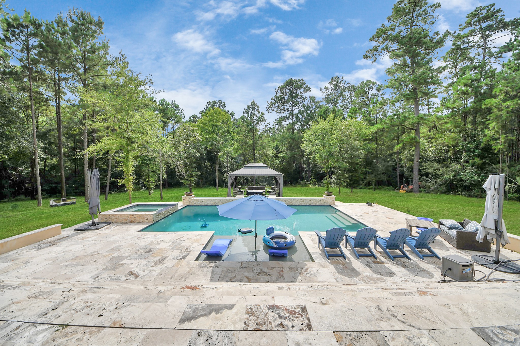 130 Bighorn Road Huntsville, TX 77340 - Photo 33 of 41 a view of a backyard with sitting area