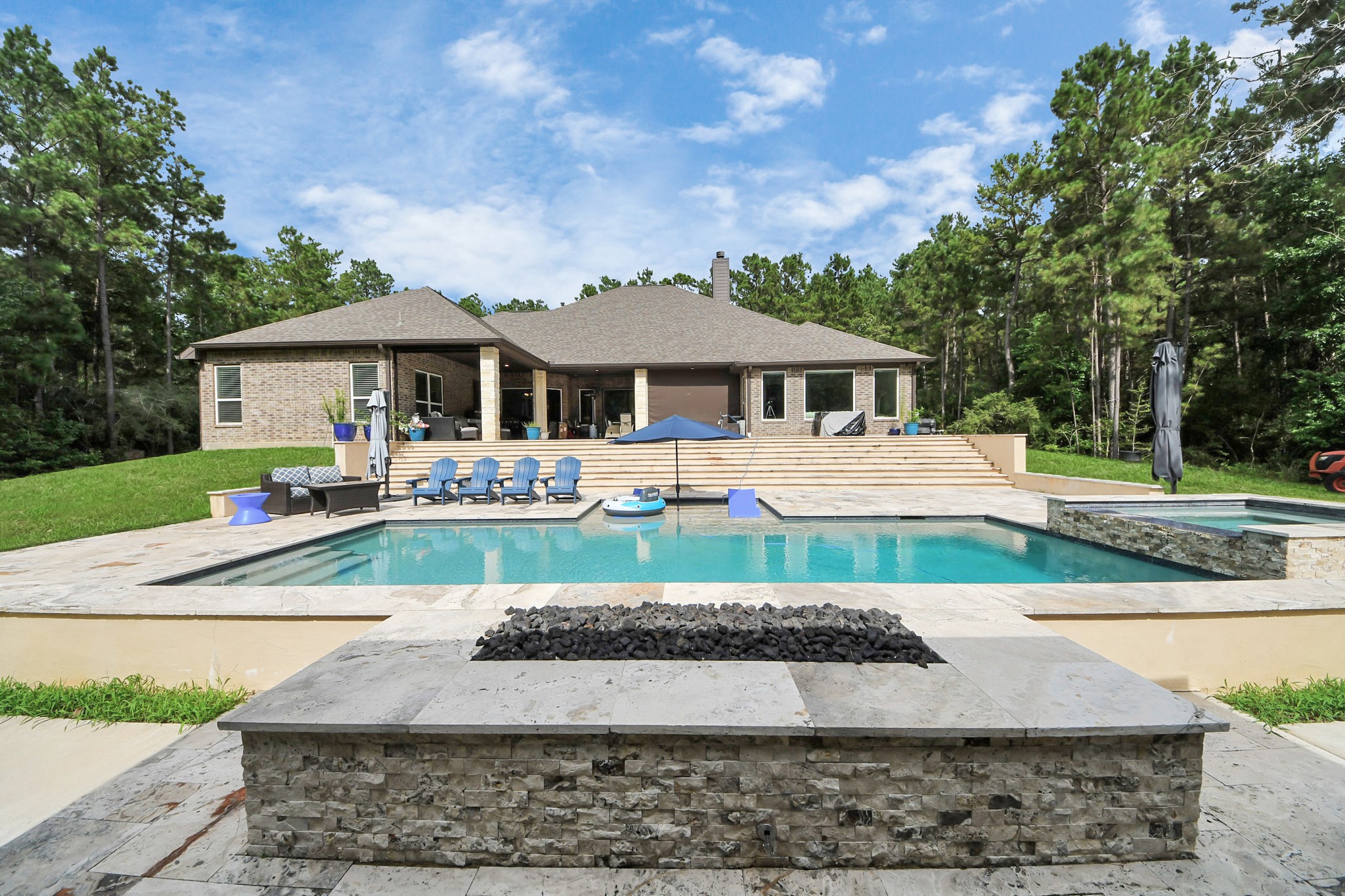 130 Bighorn Road Huntsville, TX 77340 - Photo 36 of 41 a front view of a house with garden