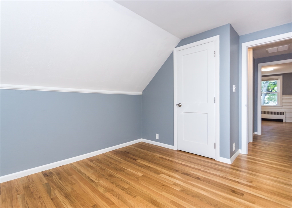 1166 Trapelo Road Waltham, MA 02451 - Photo 20 of 30 a view of empty room with wooden floor