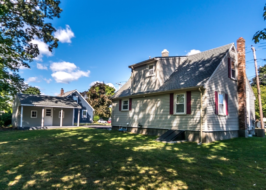 1166 Trapelo Road Waltham, MA 02451 - Photo 27 of 30 a front view of house with yard and green space
