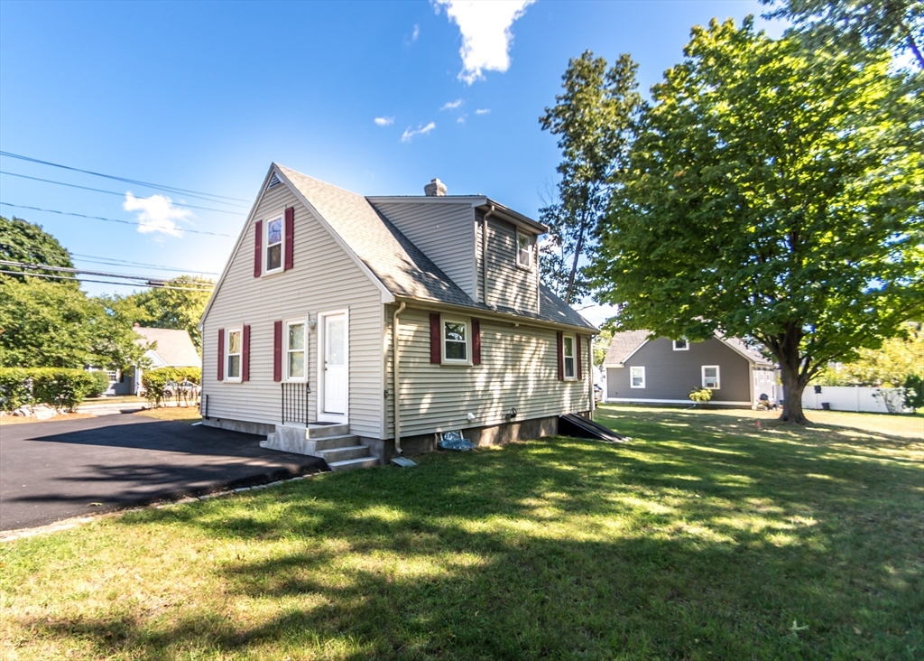 1166 Trapelo Road Waltham, MA 02451 - Photo 28 of 30 a view of a house with a big yard