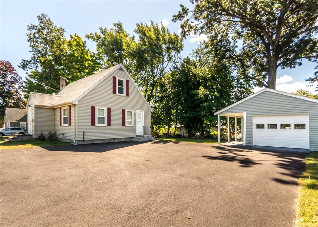 1166 Trapelo Road Waltham, MA 02451 - Photo 5 of 30 a view of a white house with a yard