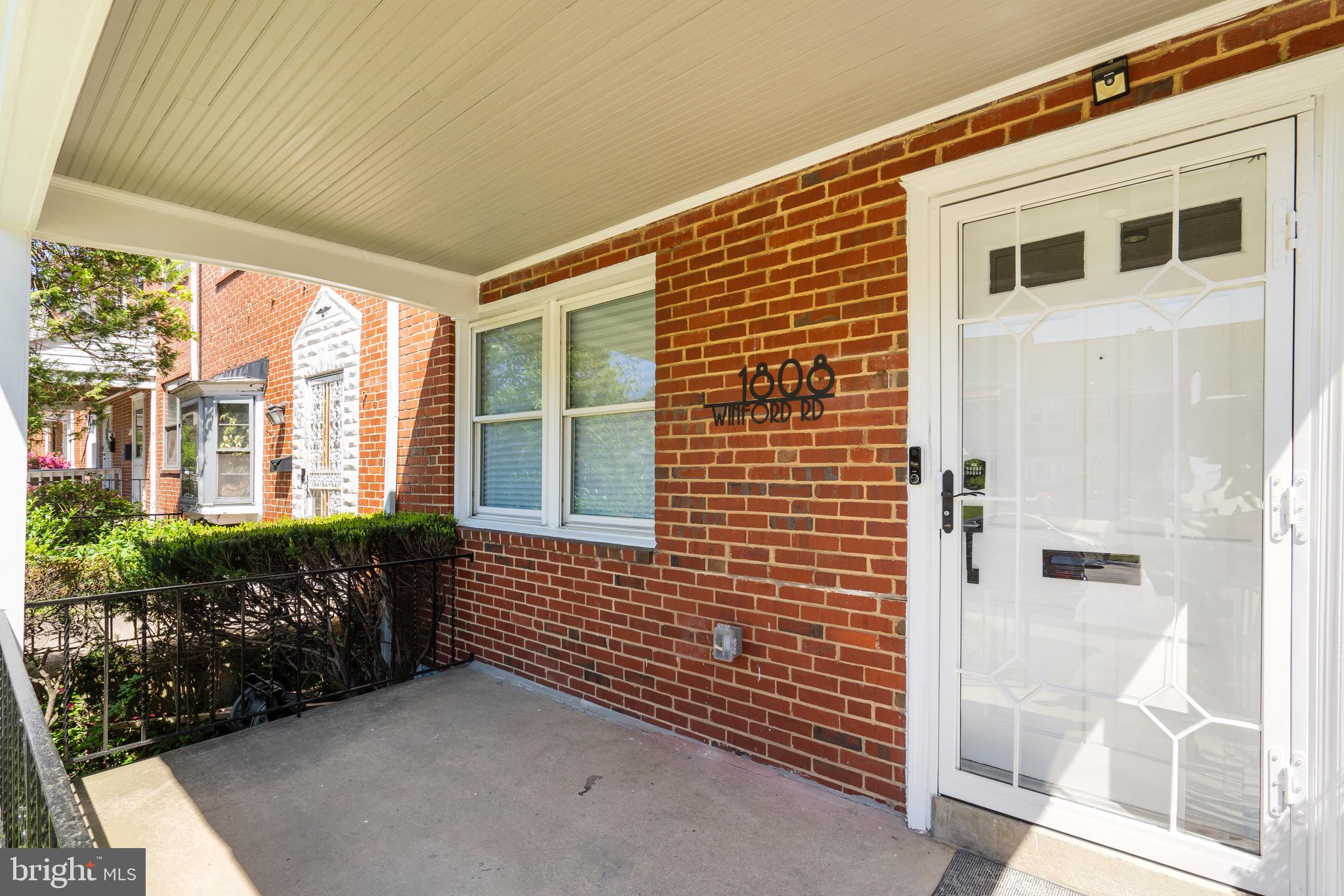 1808 Winford Road Baltimore, MD 21239 - Photo 2 of 39 a view of house with front door