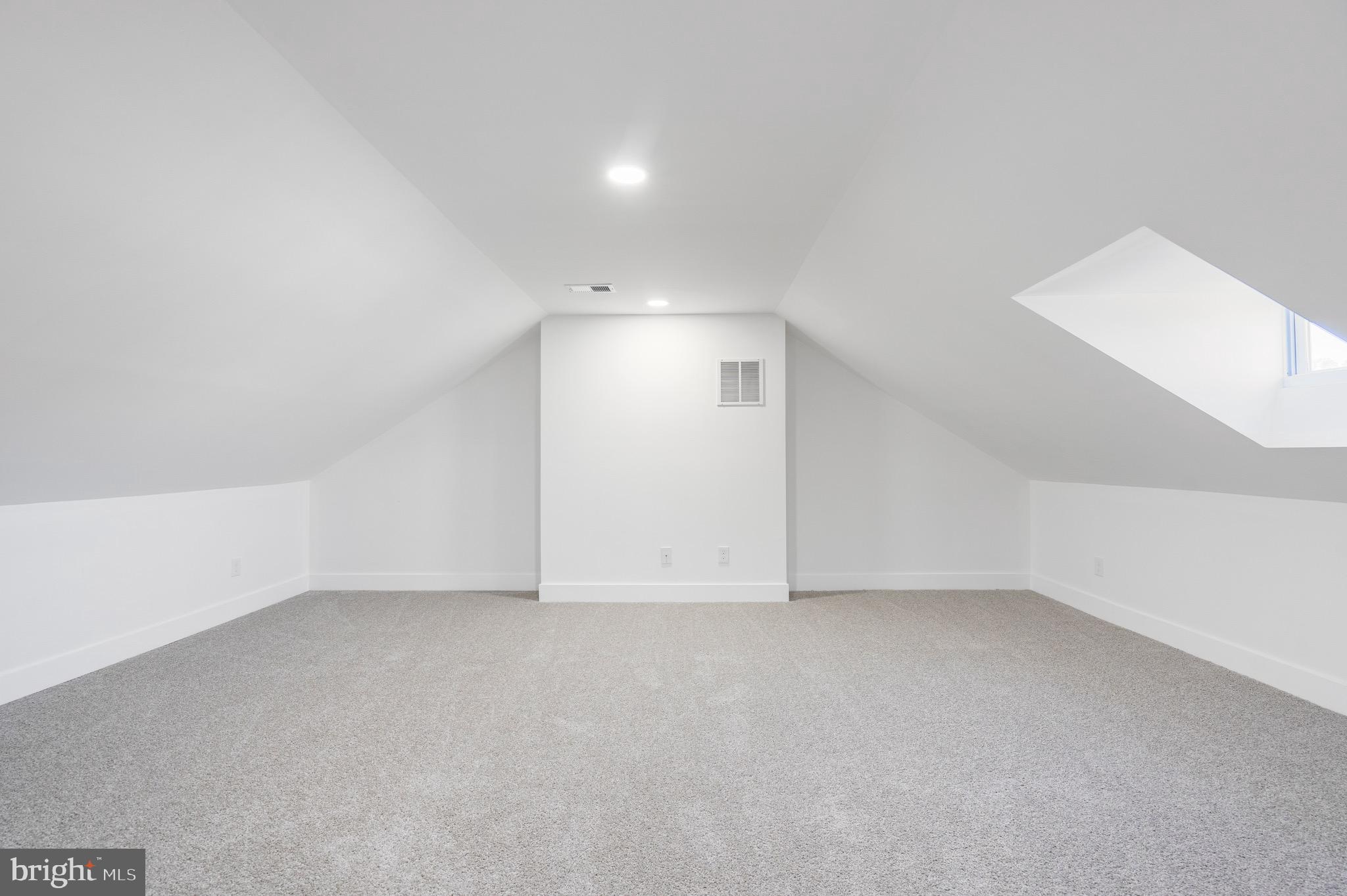 1808 Winford Road Baltimore, MD 21239 - Photo 29 of 39 a view of an empty room with a window