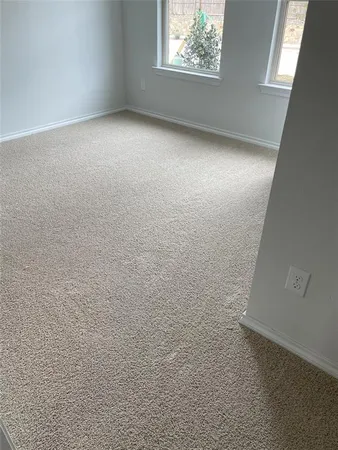 a bathroom with a granite countertop sink a toilet and bathtub