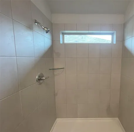 a view of balcony with wooden floor