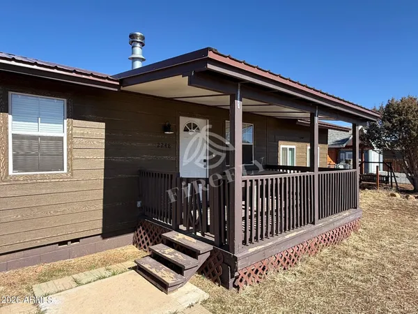 a front view of a house with garage