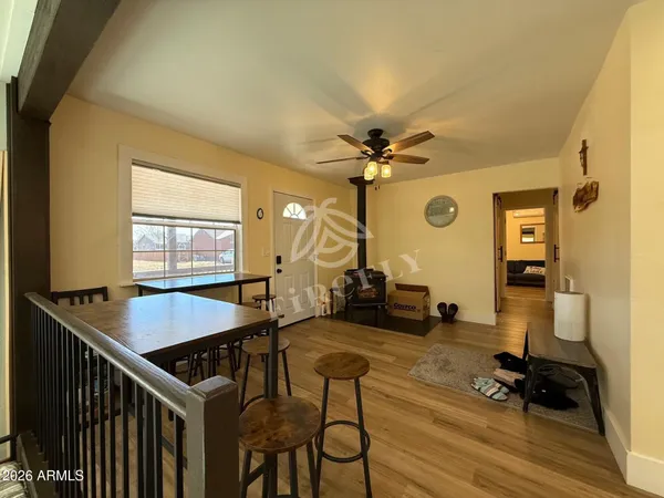 a room with furniture and wooden floor