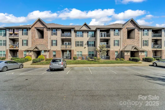 a view of multiple house with a yard