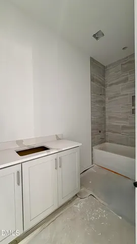 a utility room with cabinets