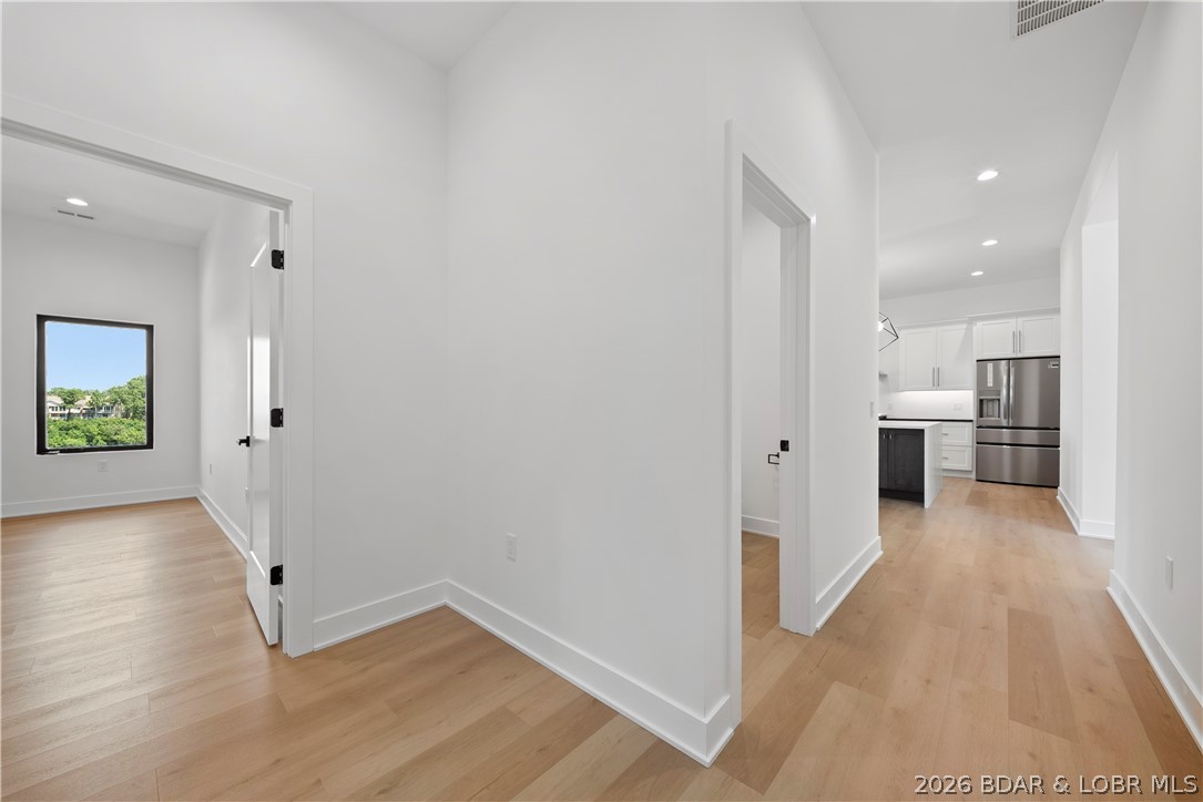 222 Red Bud Road Lake Ozark, MO 65049 - Photo 23 of 64 Wide hallway providing easy access throughout the