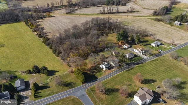 a view of a swimming pool with a yard