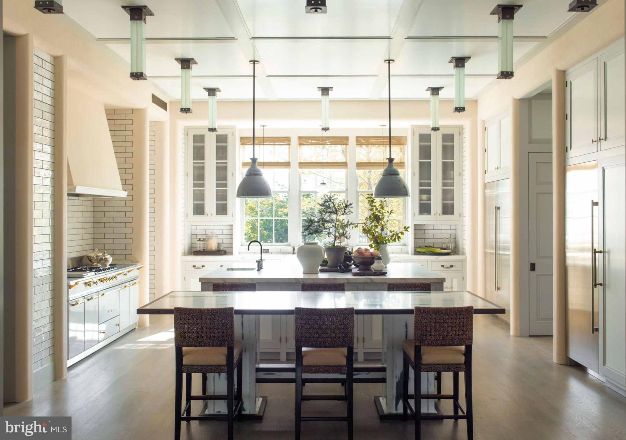 933 Hillside Road Lutherville-Timonium, MD 21093 - Photo 32 of 57 a dining room with furniture a chandelier and wooden floor