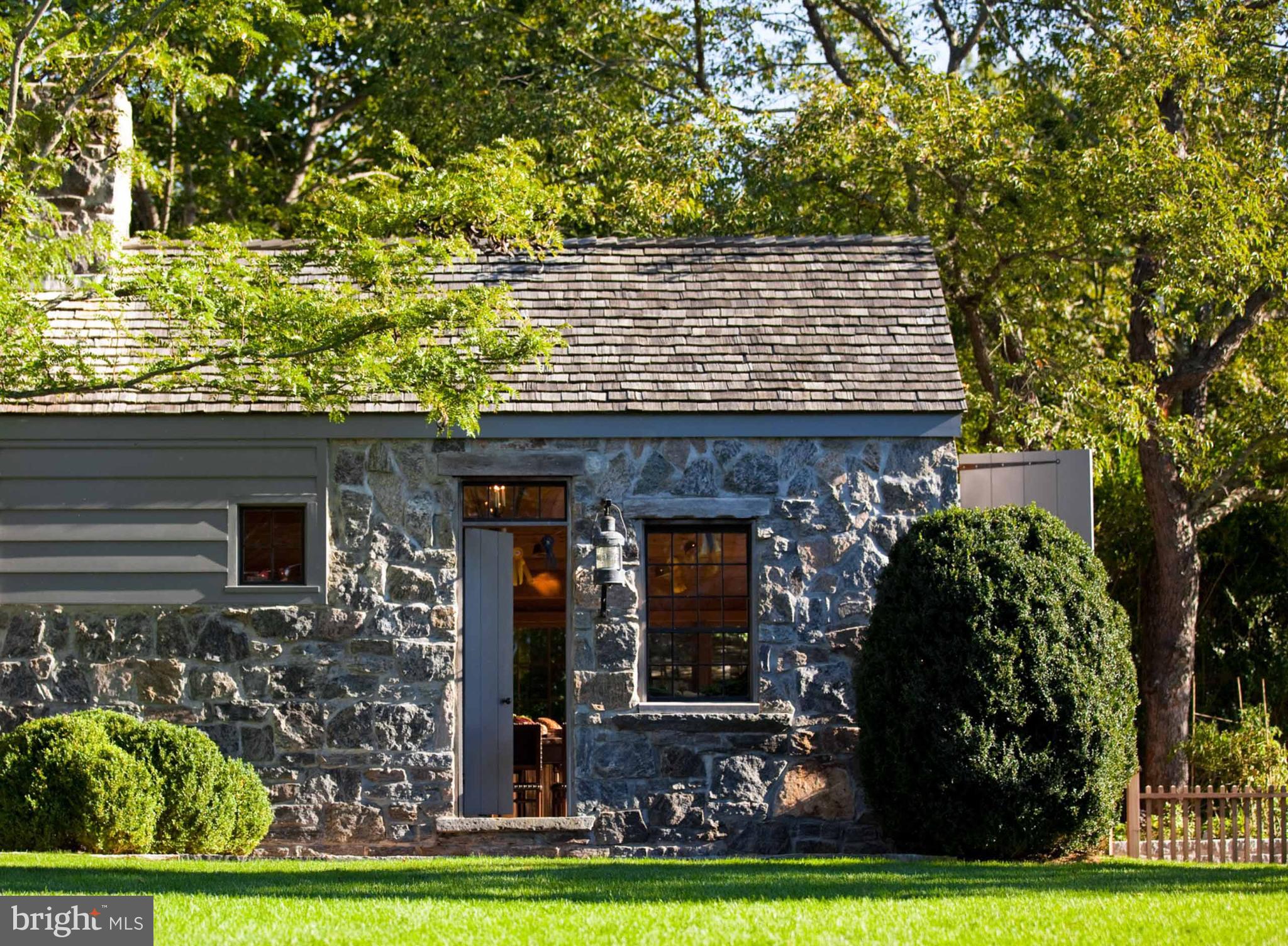 933 Hillside Road Lutherville-Timonium, MD 21093 - Photo 43 of 57 a front view of a house with garden