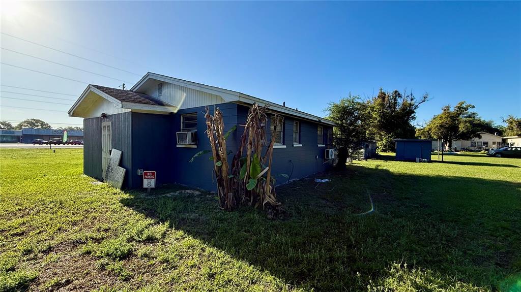 1314 North Combee Road, Unit 4 Lakeland, FL 33801 - Photo 3 of 12 a view of a back yard of the house