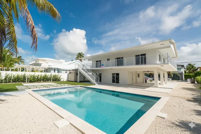 a view of a house with a swimming pool