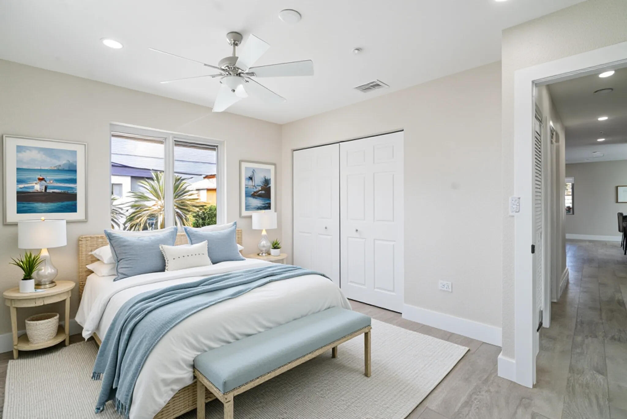 392 Laguna Avenue Key Largo, FL 33037 - Photo 24 of 42 a bedroom with a bed and a chandelier