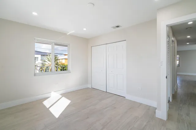 an empty room with windows