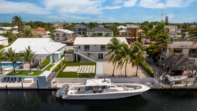 a terrace with outdoor seating and city view
