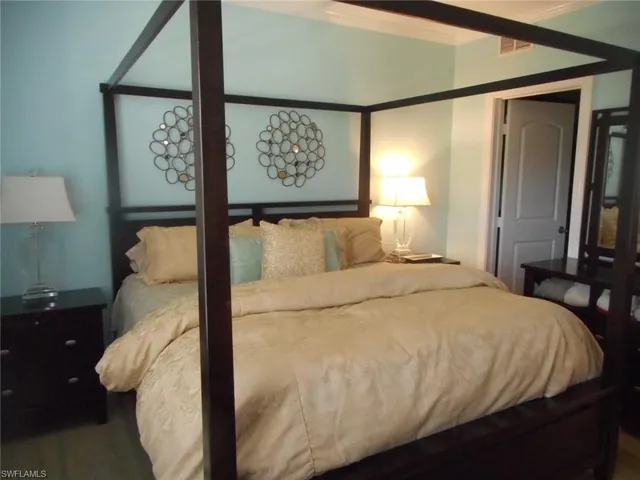 a bathroom with a tub and sink