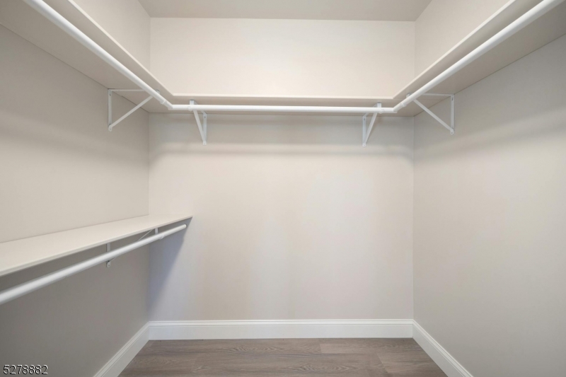 80 East Main Street, Unit 5 Mendham, NJ 07945 - Photo 20 of 28 a view of an empty walk in closet
