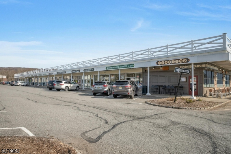 80 East Main Street, Unit 5 Mendham, NJ 07945 - Photo 25 of 28 a view of a cars park in front of building
