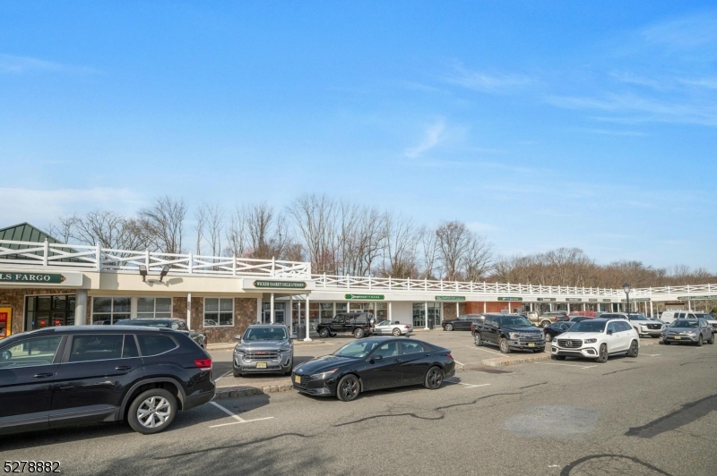 80 East Main Street, Unit 5 Mendham, NJ 07945 - Photo 27 of 28 a cars parked in front of a building