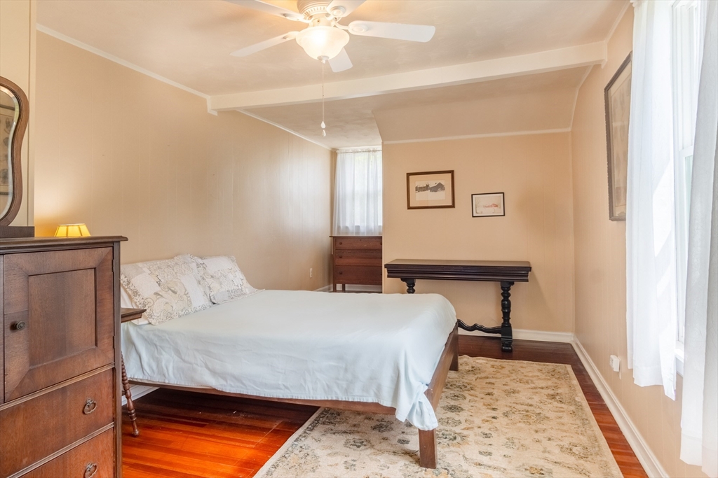 160 Abbott Street Springfield, MA 01118 - Photo 20 of 34 a bedroom with a bed and a dresser