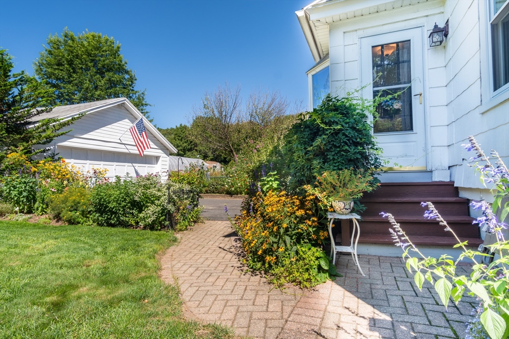 160 Abbott Street Springfield, MA 01118 - Photo 24 of 34 a front view of a house with a yard