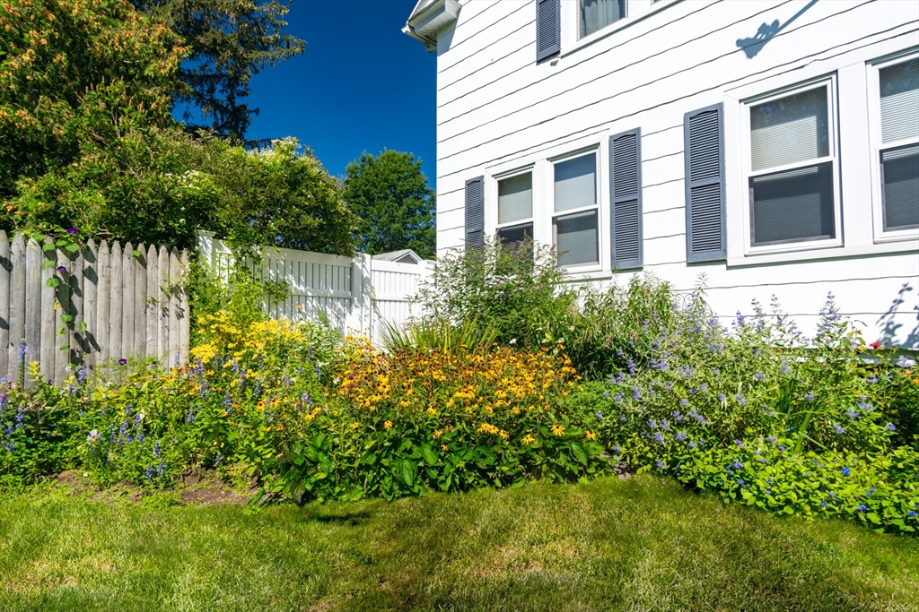 160 Abbott Street Springfield, MA 01118 - Photo 28 of 34 a view of a house with a yard and fountain in front of it