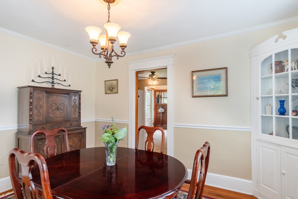 160 Abbott Street Springfield, MA 01118 - Photo 8 of 34 a view of a dining room with furniture wooden floor and chandelier