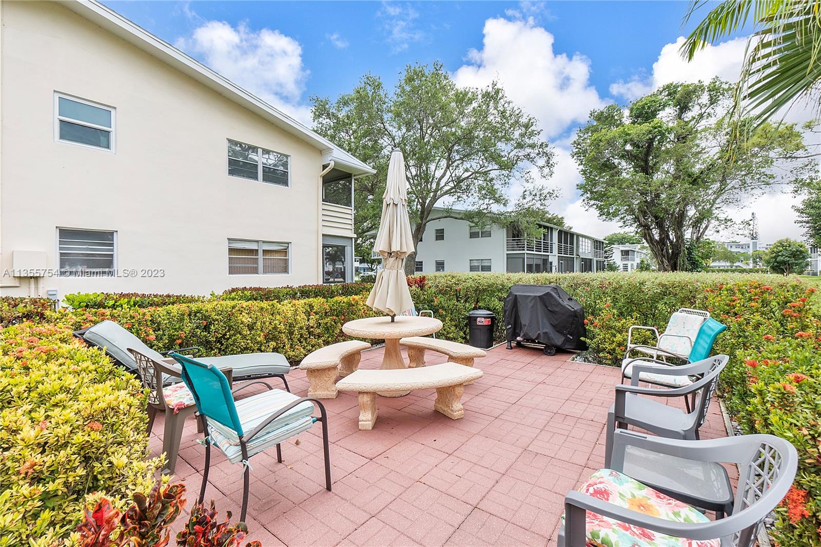 357 Durham, Unit 357 Deerfield Beach, FL 33442 - Photo 27 of 41 a outdoor space with patio furniture