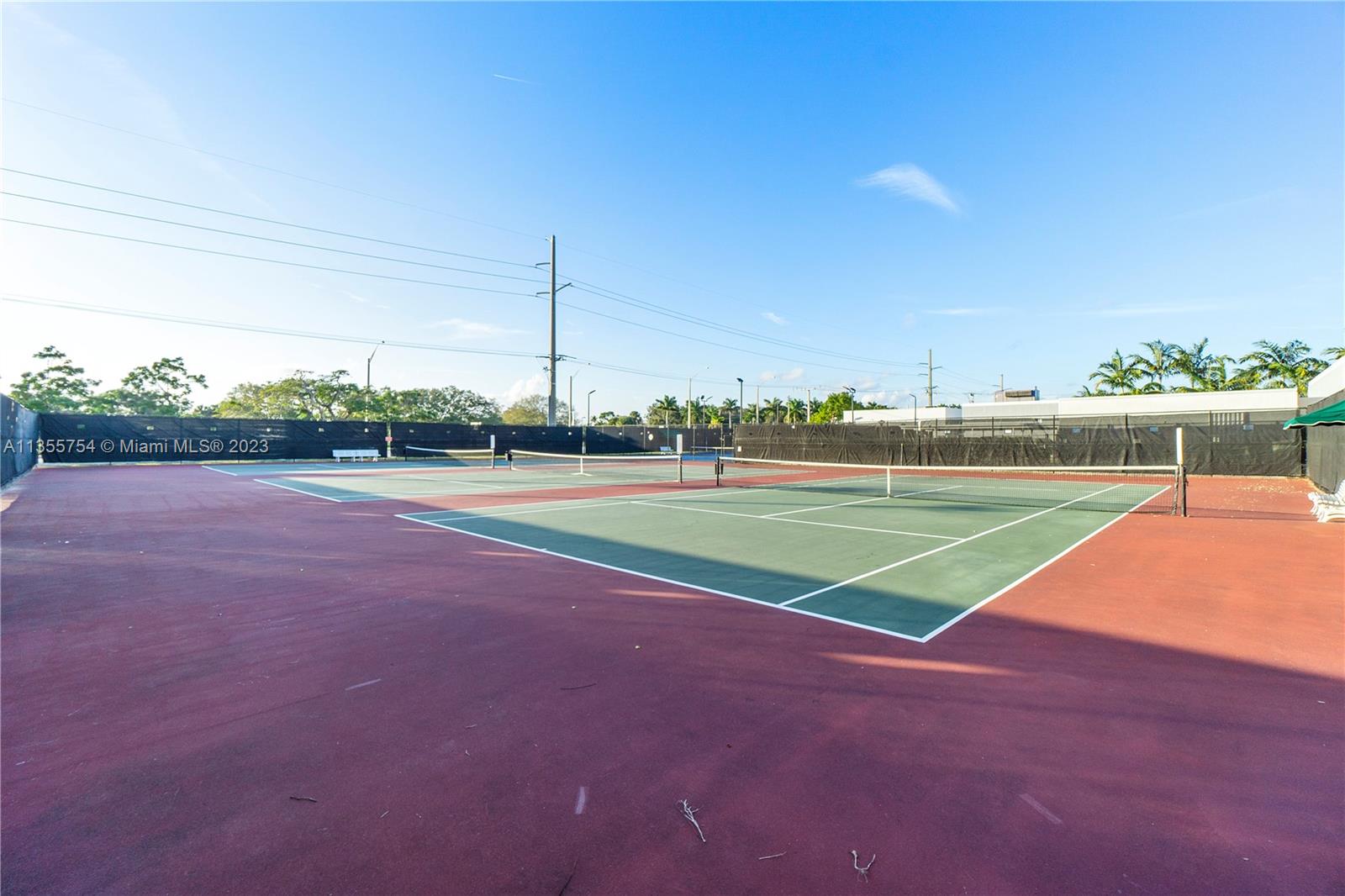 357 Durham, Unit 357 Deerfield Beach, FL 33442 - Photo 36 of 41 a view of a tennis court