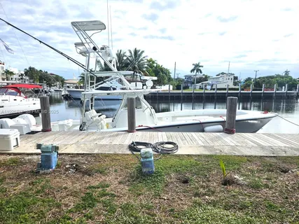 a view of a lake with a house in the background