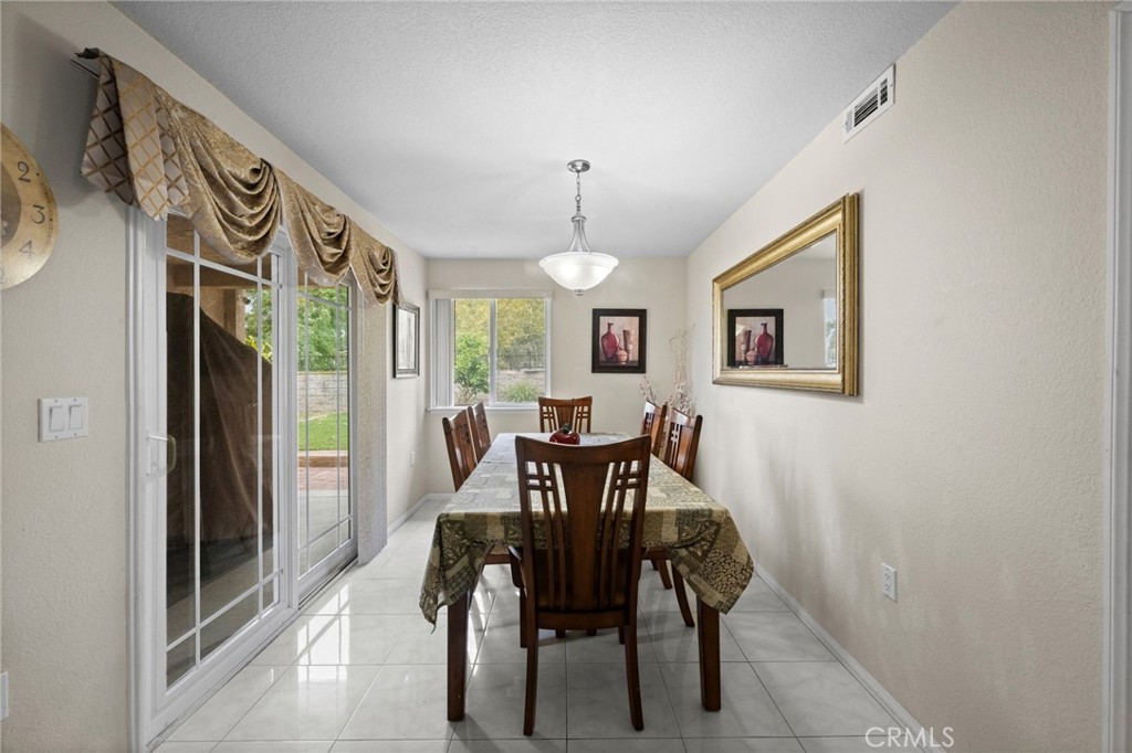 605 Bronco Way Walnut, CA 91789 - Photo 19 of 69 a dining room with furniture and window