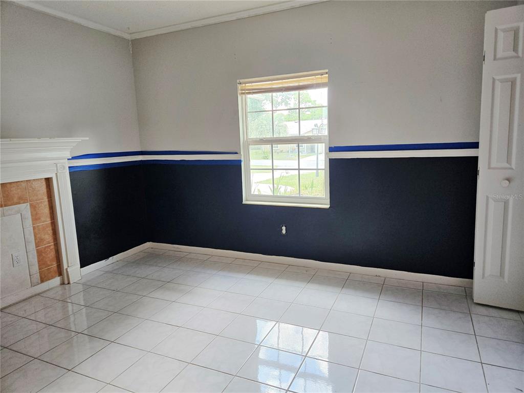 19 Spring Dr Place Ocala, FL 34472 - Photo 13 of 29 a view of an empty room with a window