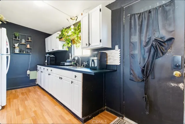 a view of a yard with table and chairs