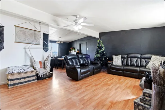 a kitchen with stainless steel appliances a refrigerator sink and cabinets