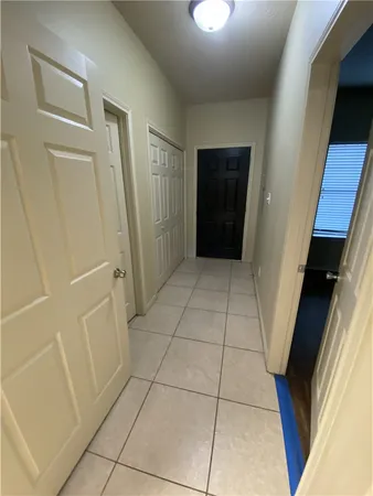 a bathroom with a double vanity sink a mirror and a shower